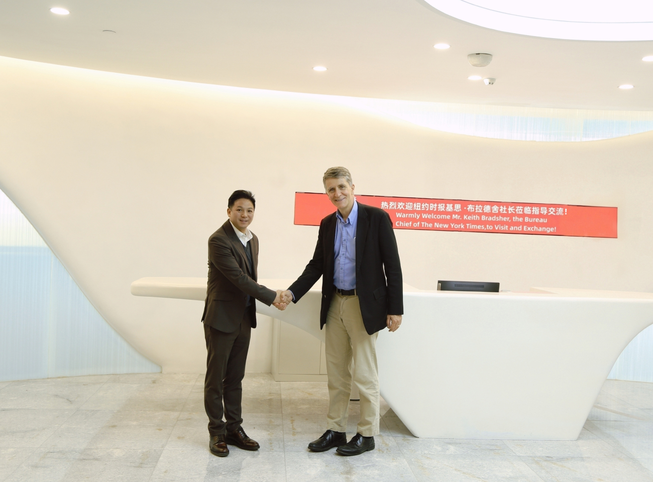 《纽约时报》社长对首信环保进行专访